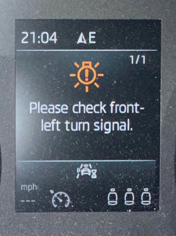 Please check front-left turn signal warning message
